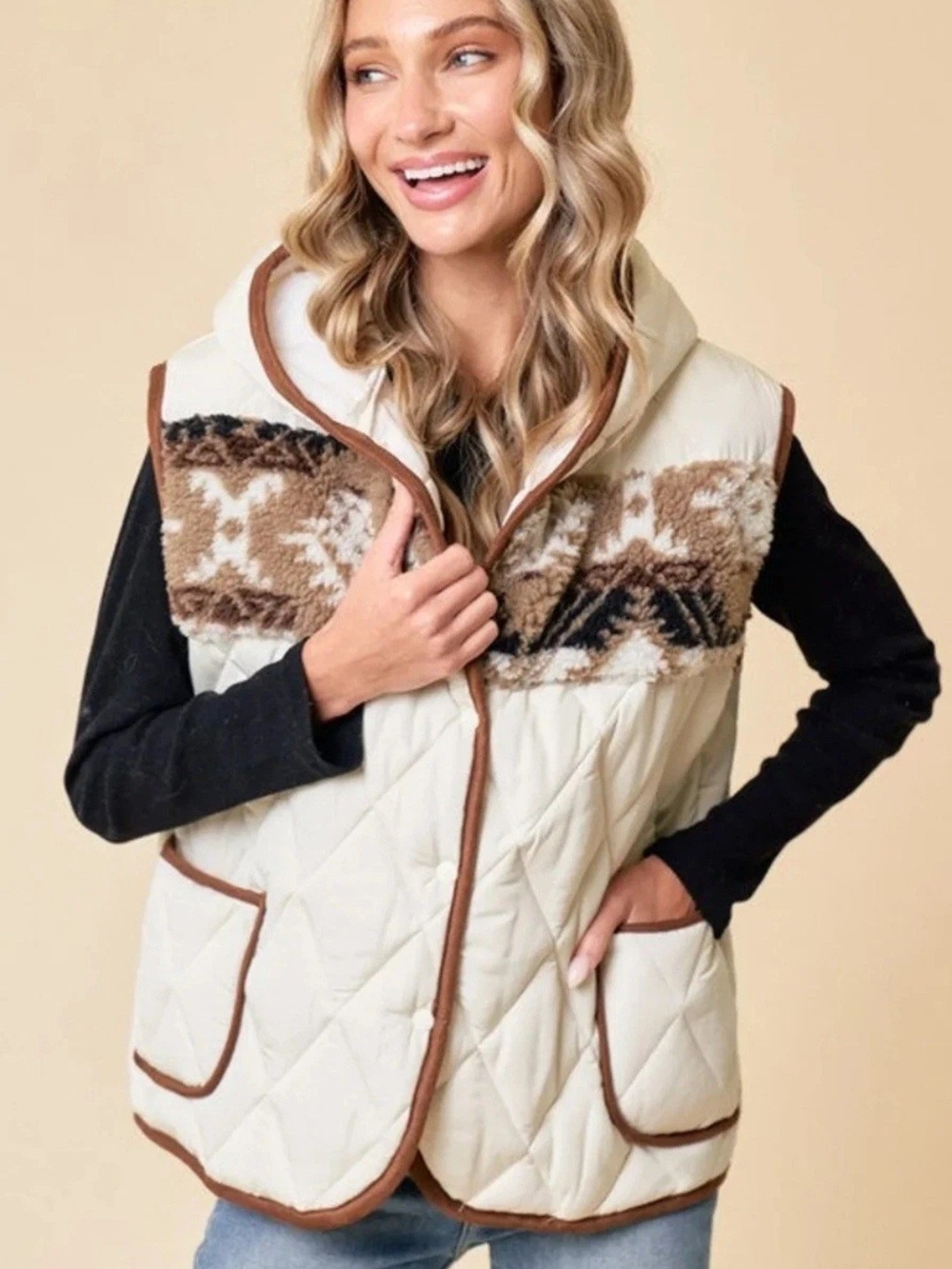 Hooded, quilted vest with beautiful aztec detail